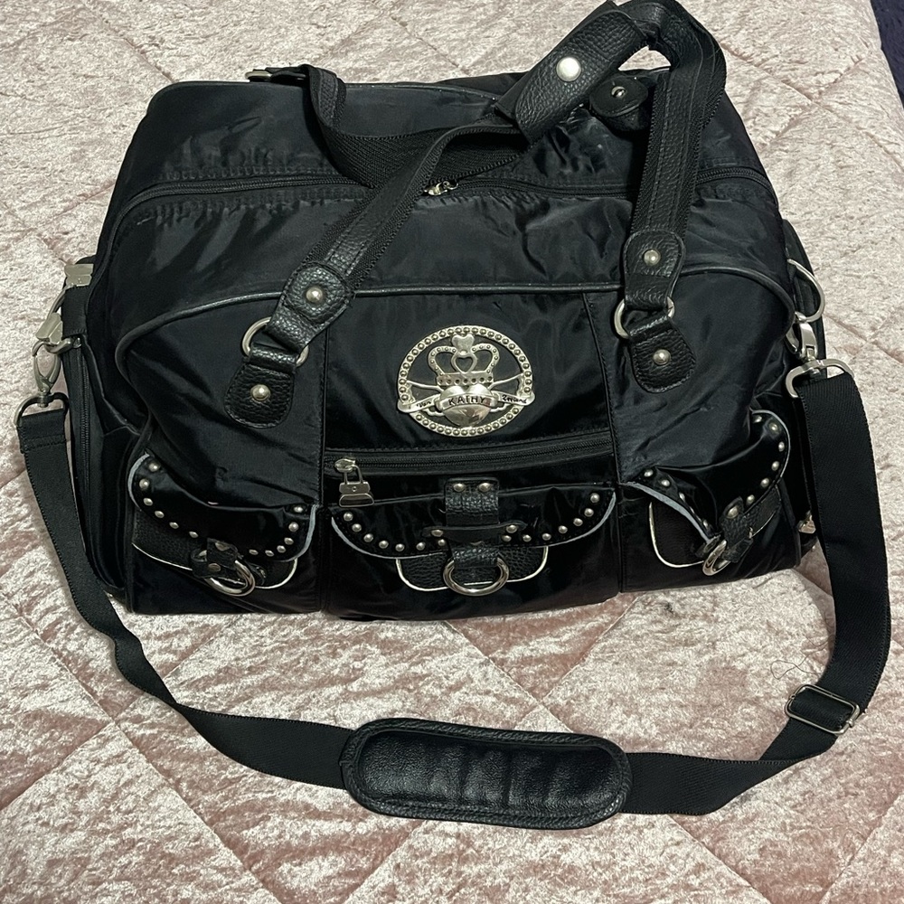 KATHY VAN ZEELAND TRAVEL BAG WITH STRAP.